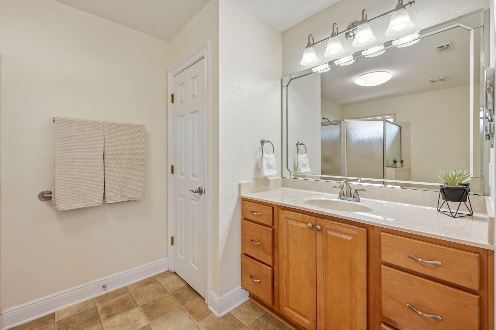 4841 Antioch Road Crestview, FL 32536 - Photo 59 of 70 a bathroom with a double vanity sink and a mirror