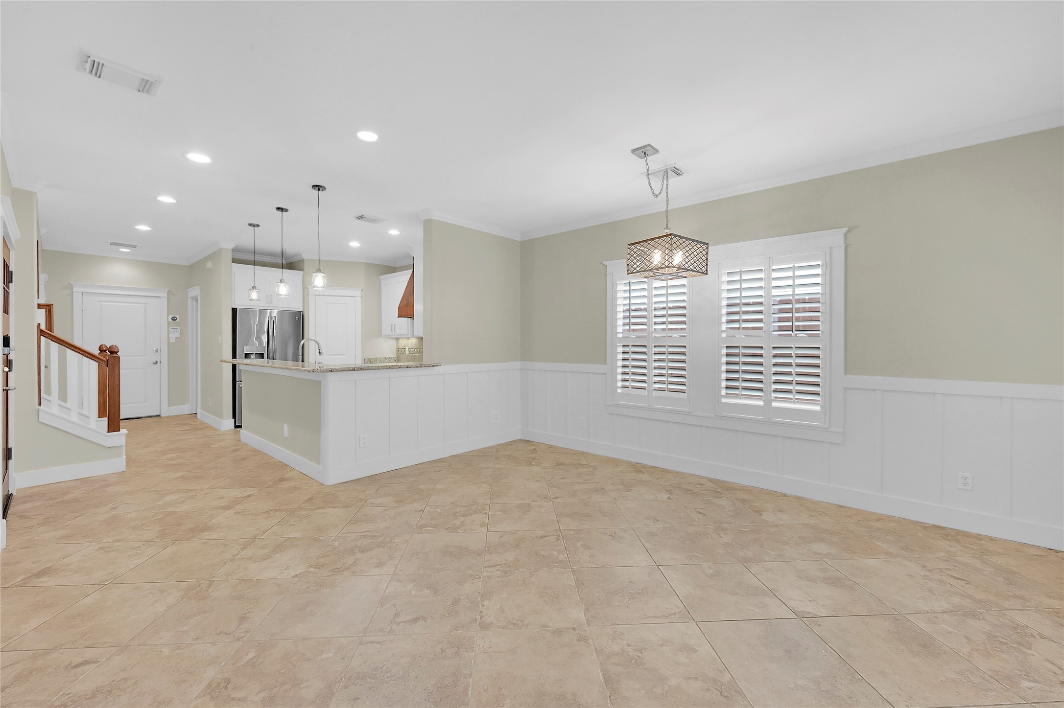 4418 Edsee Street Houston, TX 77009 - Photo 7 of 28 Heading back through the dining room, you're lead to the kitchen, located to the left of the entry.