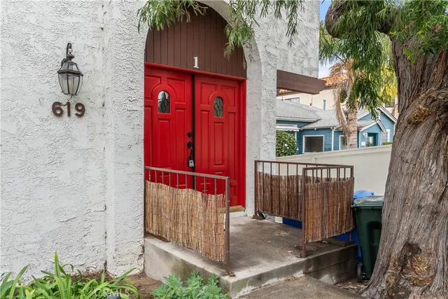 a picture of a bench in front of a wall