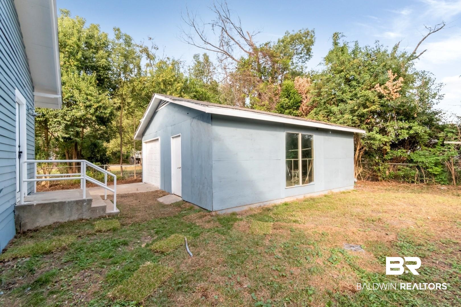555 Michigan Avenue Mobile, AL 36604 - Photo 24 of 28 View of outdoor structure with a lawn and a garage