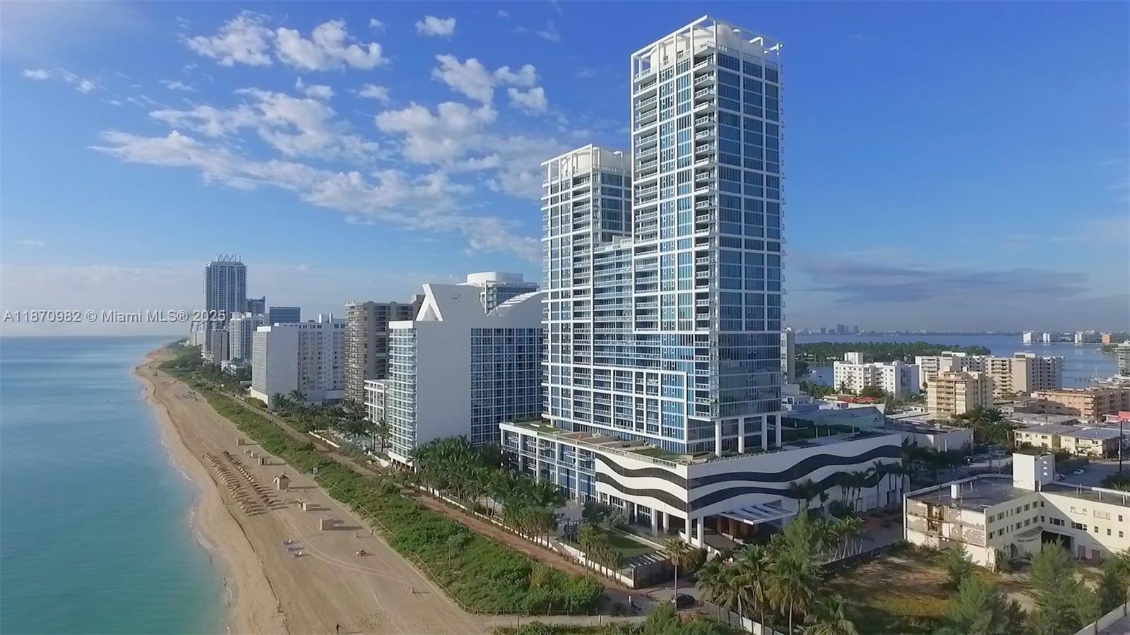 6799 Collins Avenue, Unit 1601 Miami Beach, FL 33141 - Photo 14 of 27 a city view with tall buildings