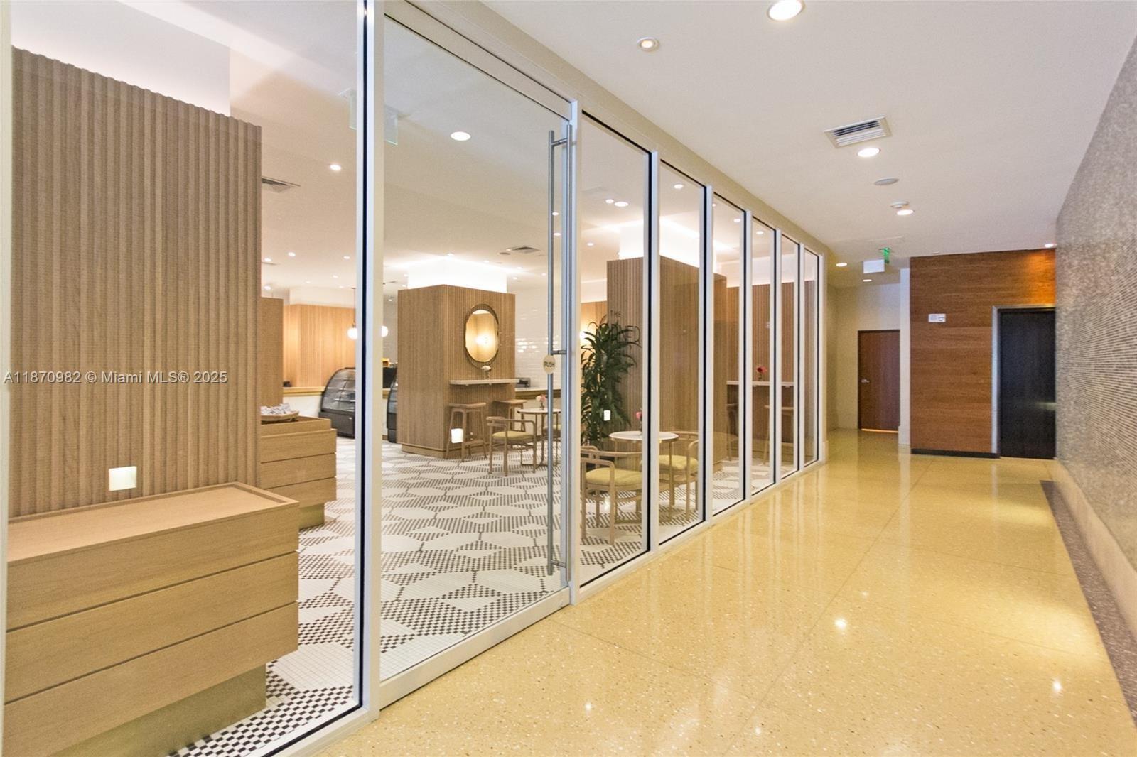 6799 Collins Avenue, Unit 1601 Miami Beach, FL 33141 - Photo 26 of 27 a bathroom with a tub and shower