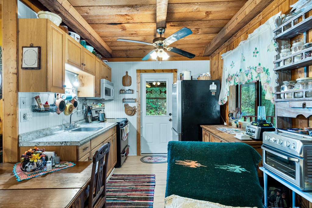 64 Timberline Road Murphy, NC 28906 - Photo 15 of 45 a kitchen with lots of counter top space and stainless steel appliances