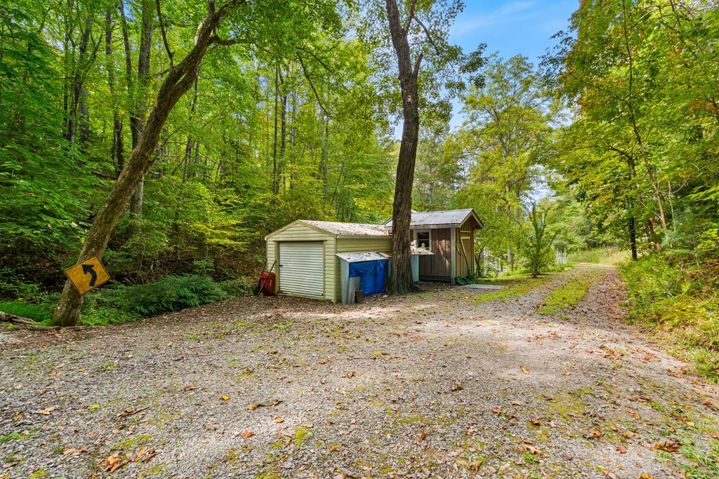 64 Timberline Road Murphy, NC 28906 - Photo 37 of 45 a view of a house with a yard and large tree
