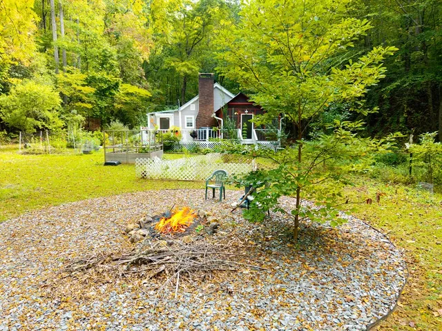 a house with swimming pool in front of it