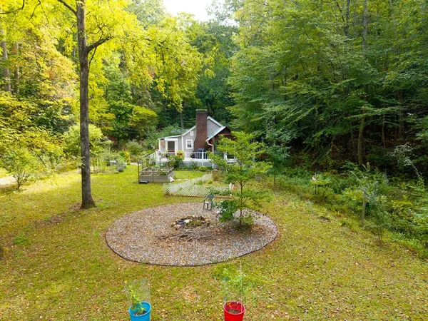 a view of a house with a swimming pool