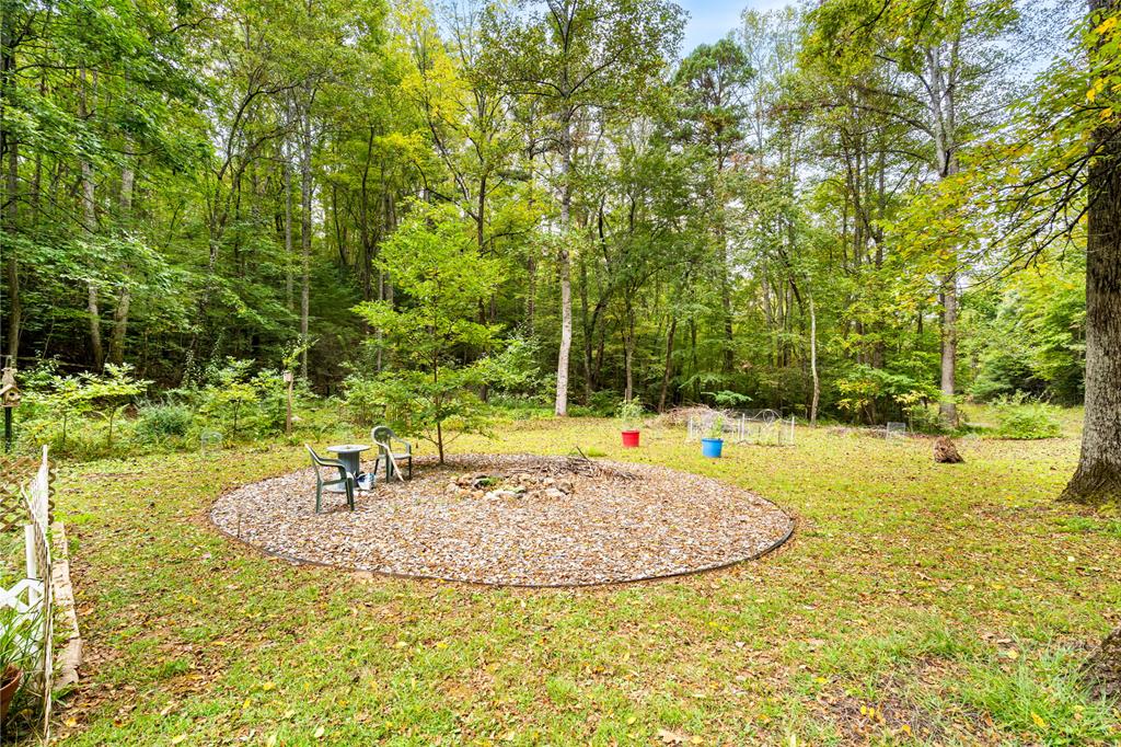 64 Timberline Road Murphy, NC 28906 - Photo 7 of 45 a view of a swimming pool with an outdoor space and seating area