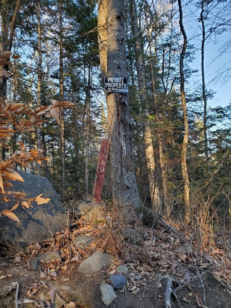 Lot 65-2 Ramsdell Ridge Road Milo, ME 04463 - Photo 22 of 26 west corner marker at road