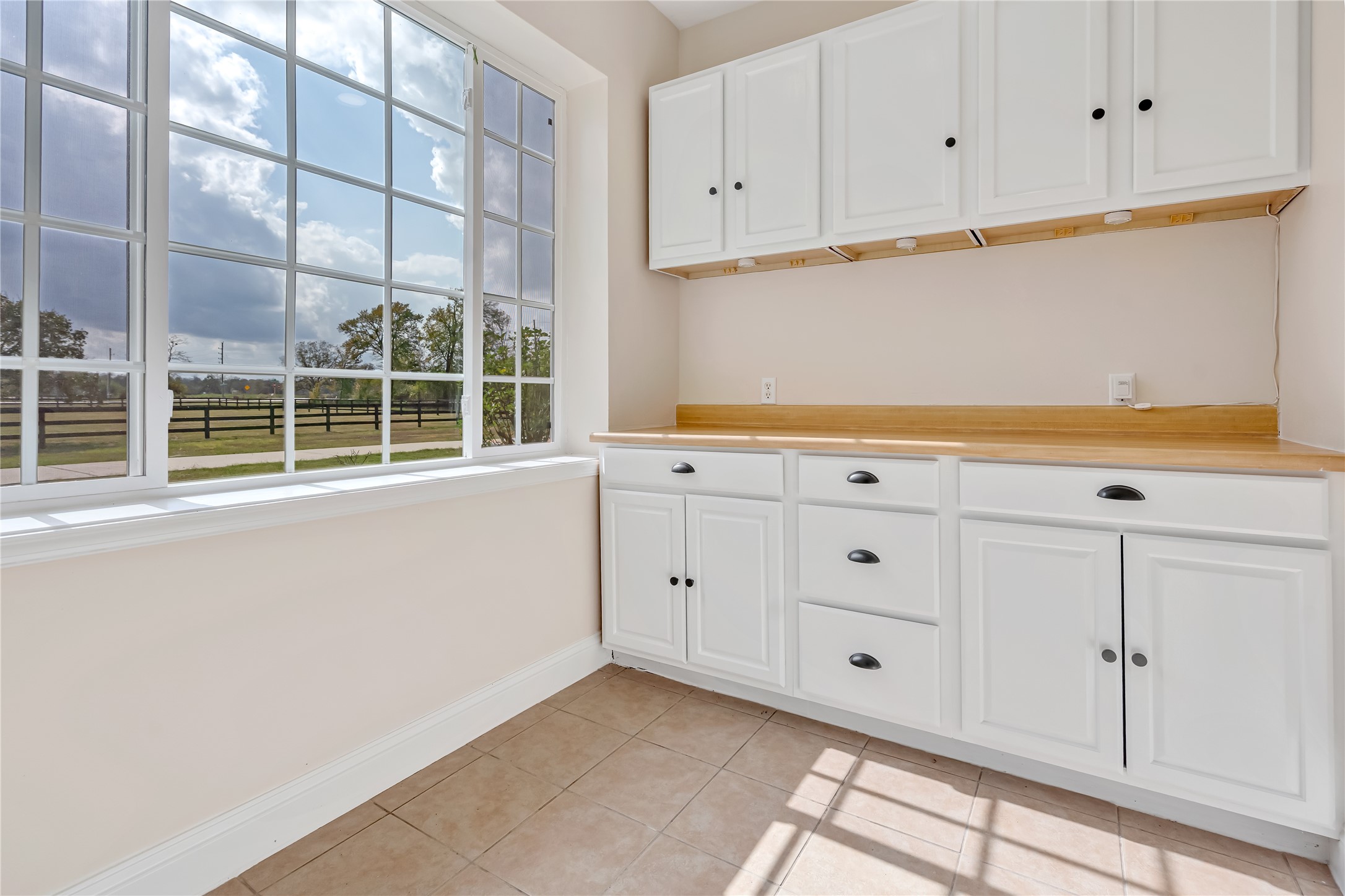 1810 McCrary Road Richmond, TX 77406 - Photo 21 of 25 a view of white kitchen with granite countertop cabinets