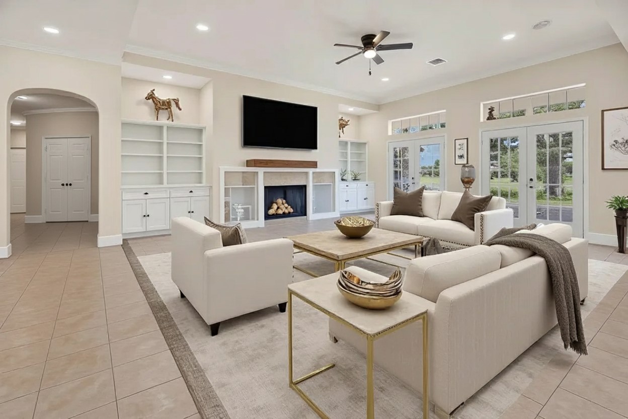 1810 McCrary Road Richmond, TX 77406 - Photo 7 of 25 a living room with furniture a fireplace and a flat screen tv