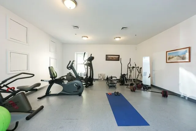 a view of a room with gym equipment