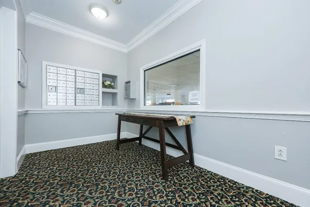 a workspace with furniture and window