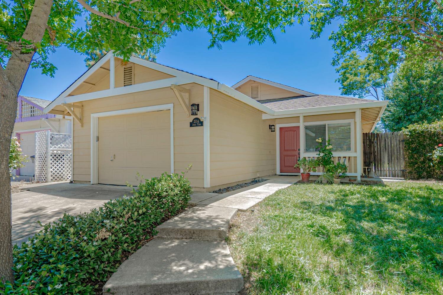 a front view of house with yard