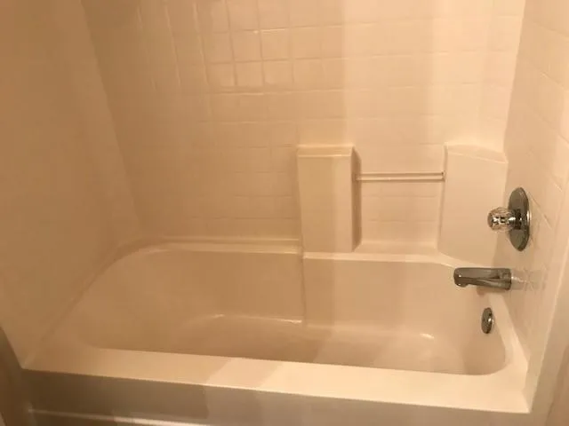 a bathroom with a bathtub
