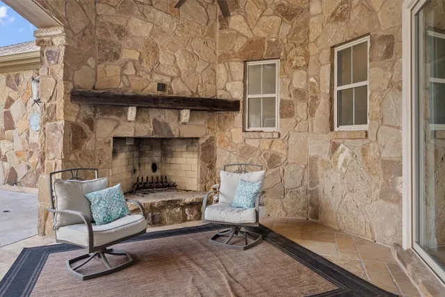 a view of swimming pool with patio