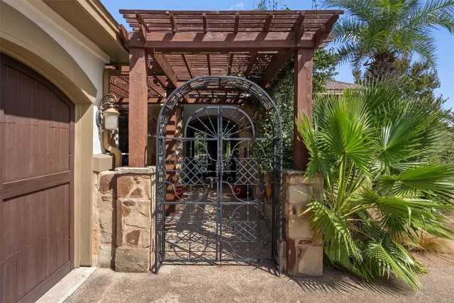 a view of a house with a tree