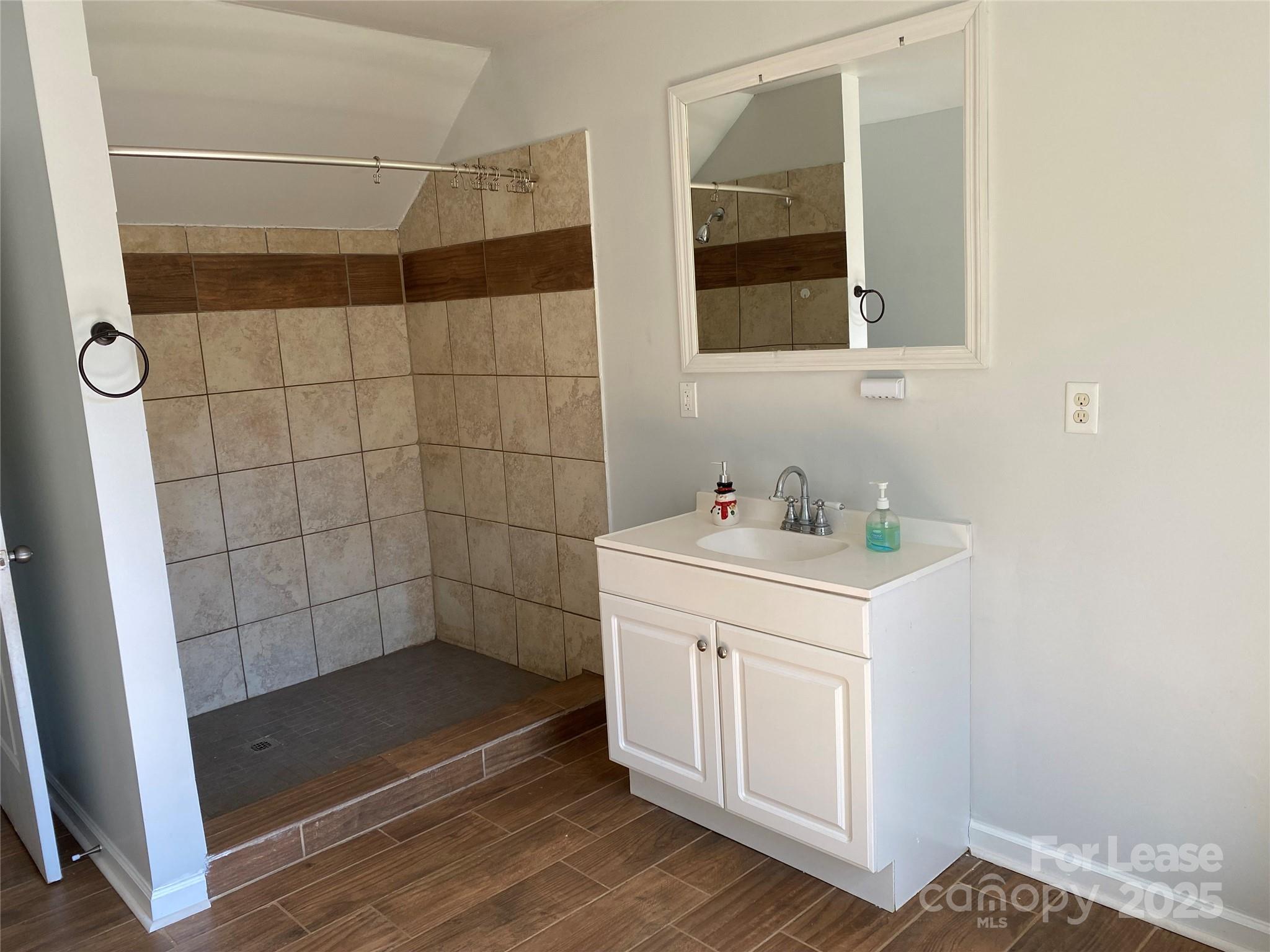 700 Colonial Avenue Gaffney, SC 29340 - Photo 9 of 9 a bathroom with a sink a toilet and shower