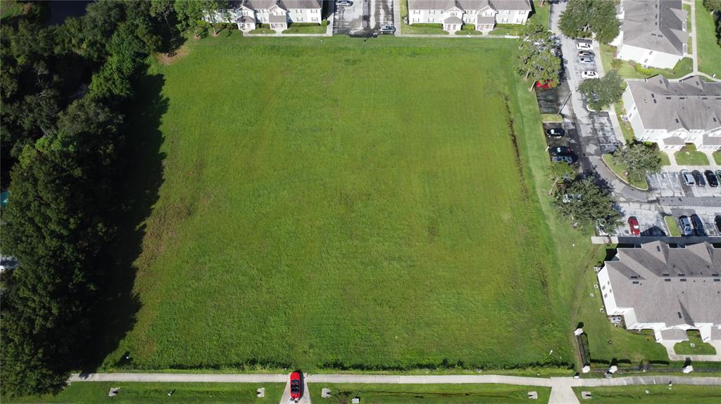 Brown Chapel Rd Street St. Cloud, FL 34769 - Photo 3 of 4 a view of a big yard