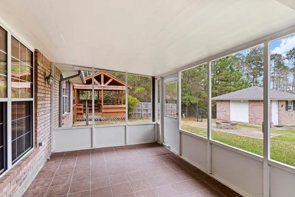 a porch with seating space