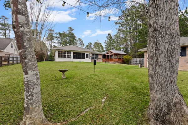an aerial view of residential house with outdoor space