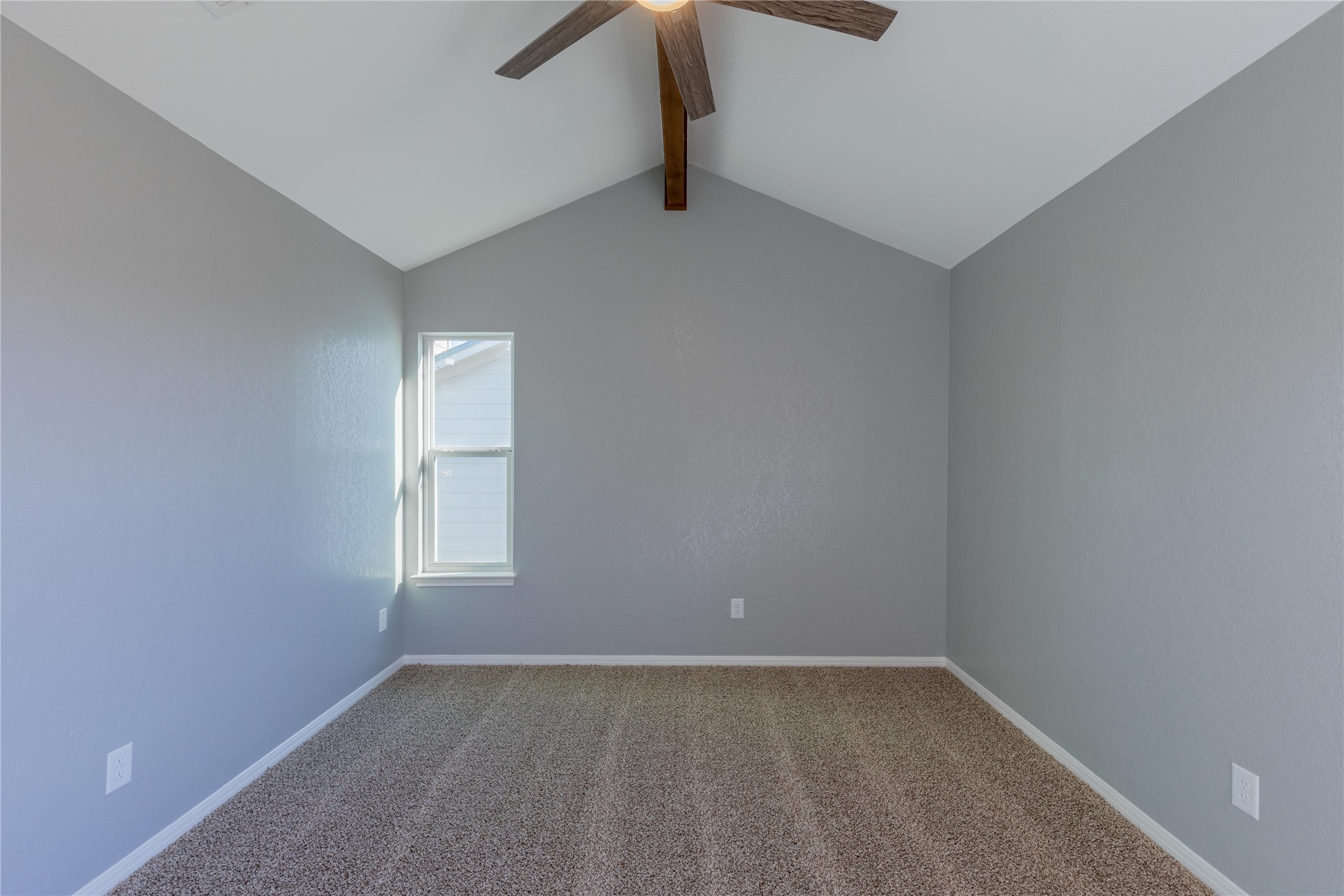 319 Rawhide Loop Round Rock, TX 78681 - Photo 18 of 28 Carpeted spare room featuring baseboards and ceiling fan