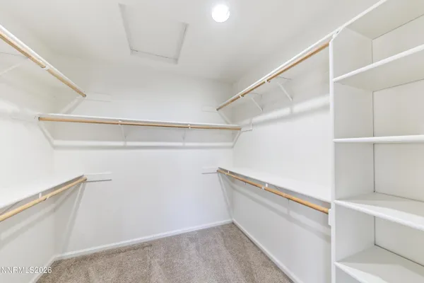 a view of an empty walk in closet