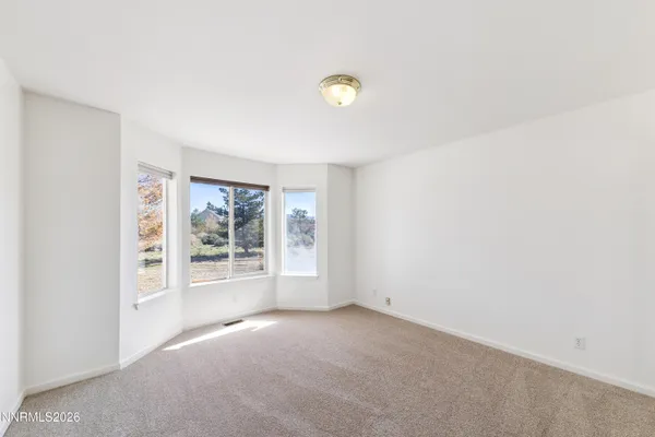 a view of empty room with window