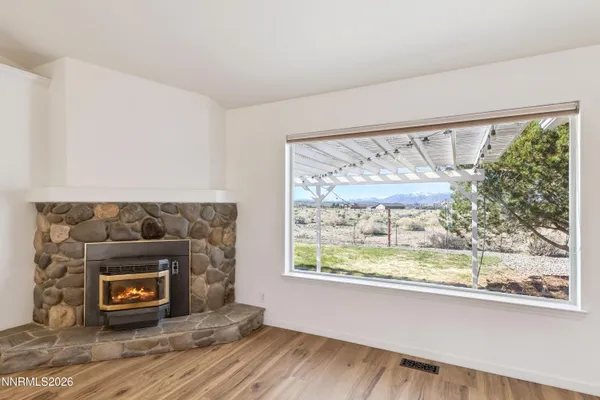 a living room with a fireplace