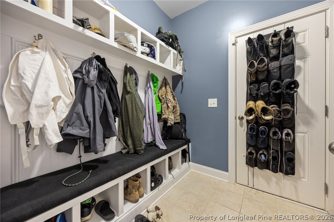 64 Cromwell Circle Cameron, NC 28326 - Photo 18 of 50 a view of walk in closet with clothes and shoes