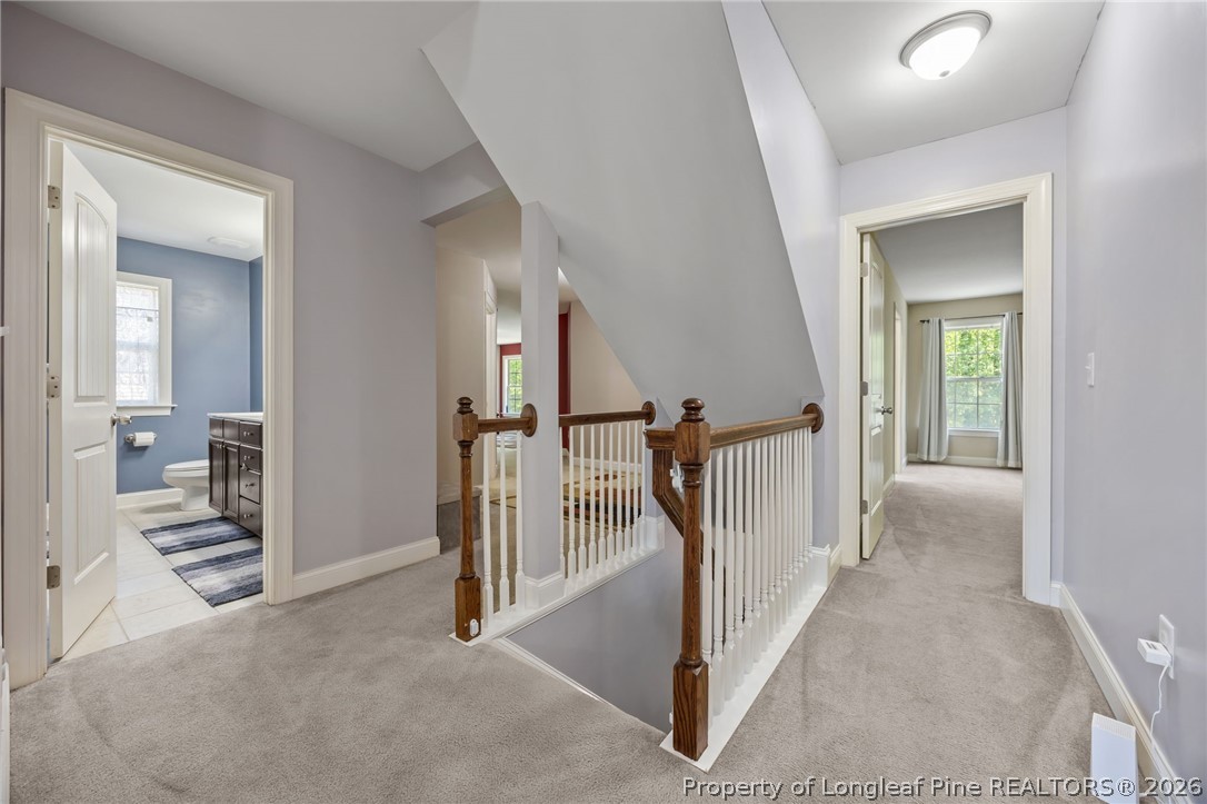 64 Cromwell Circle Cameron, NC 28326 - Photo 19 of 50 a view of a hallway with a livingroom and entryway