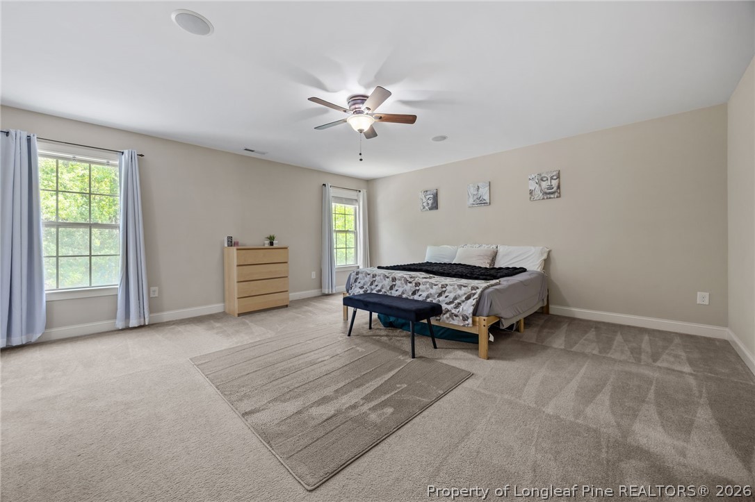 64 Cromwell Circle Cameron, NC 28326 - Photo 20 of 50 a living room with furniture and a window