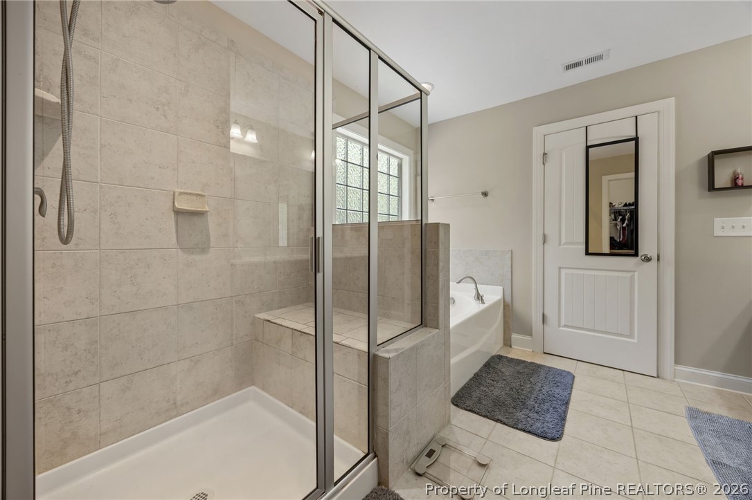 64 Cromwell Circle Cameron, NC 28326 - Photo 26 of 50 a bathroom with a shower and a sink