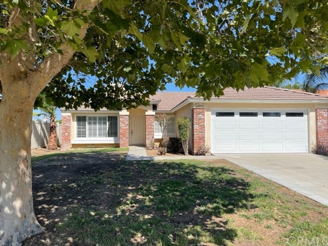 29955 Berea Road Menifee, CA 92584 - Photo 1 of 1 a front view of a house with a yard and garage