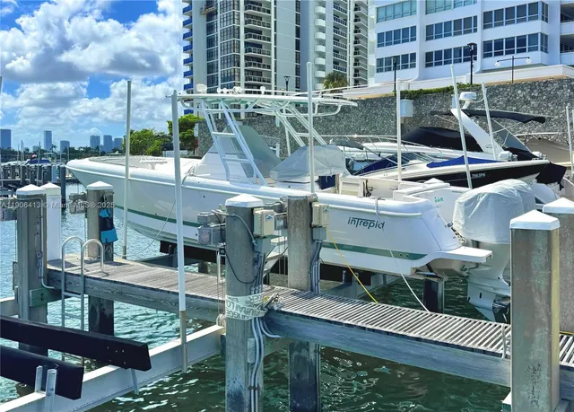 a view of balcony with a table and chairs