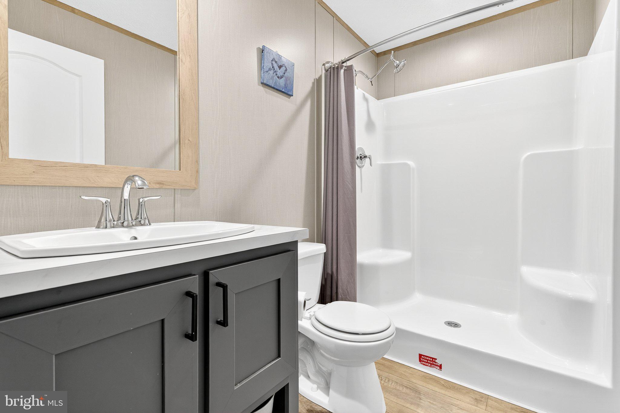 342 Frogtown Road Pequea, PA 17565 - Photo 13 of 37 a bathroom with a granite countertop sink toilet and shower