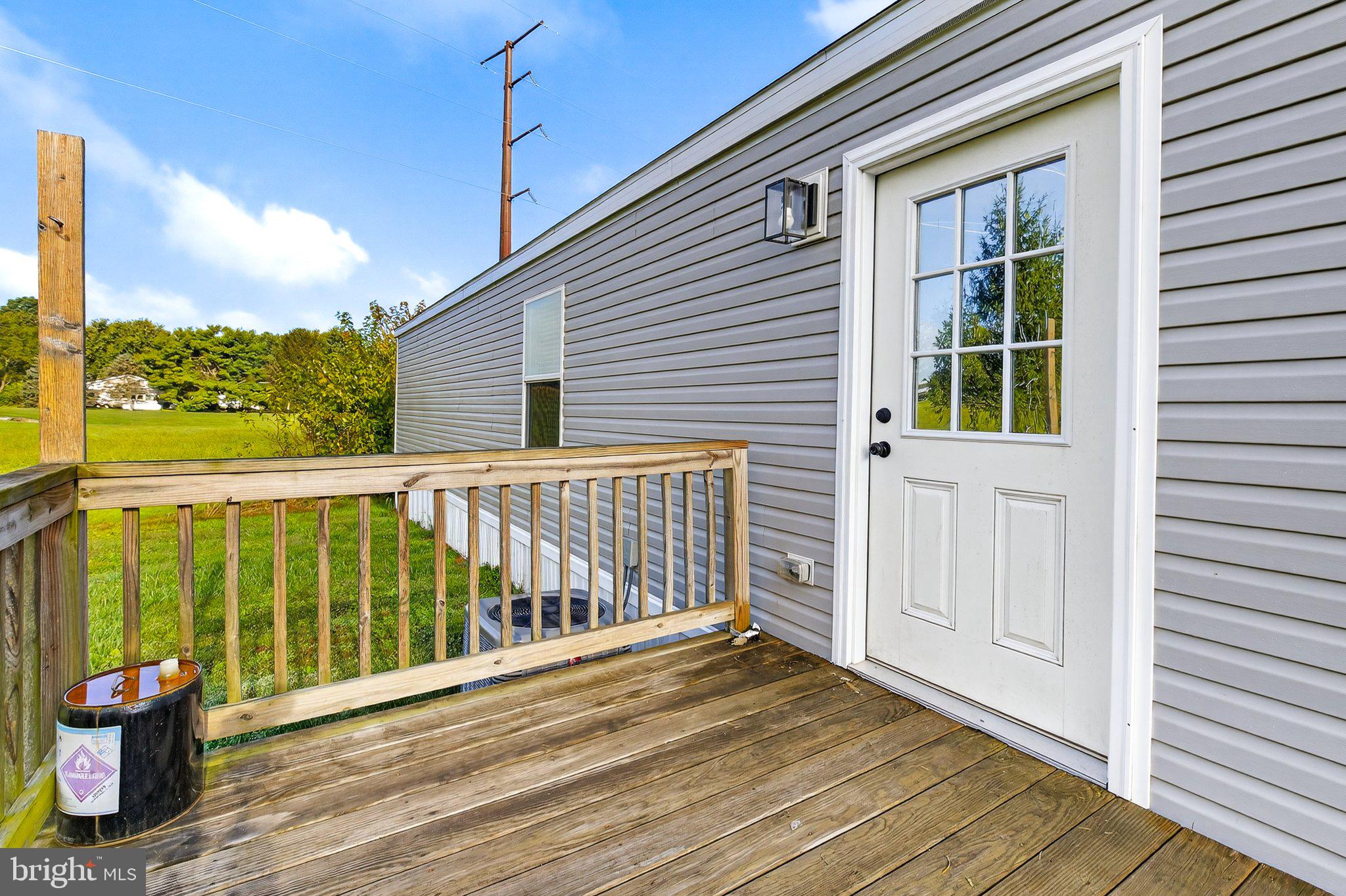 342 Frogtown Road Pequea, PA 17565 - Photo 23 of 37 a view of a balcony with wooden floor