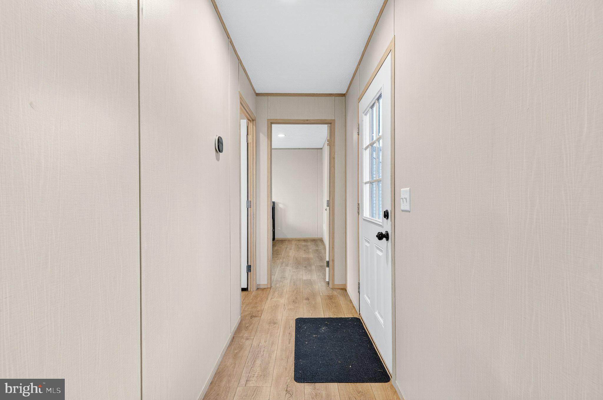 342 Frogtown Road Pequea, PA 17565 - Photo 3 of 37 a view of a hallway with a wooden floor