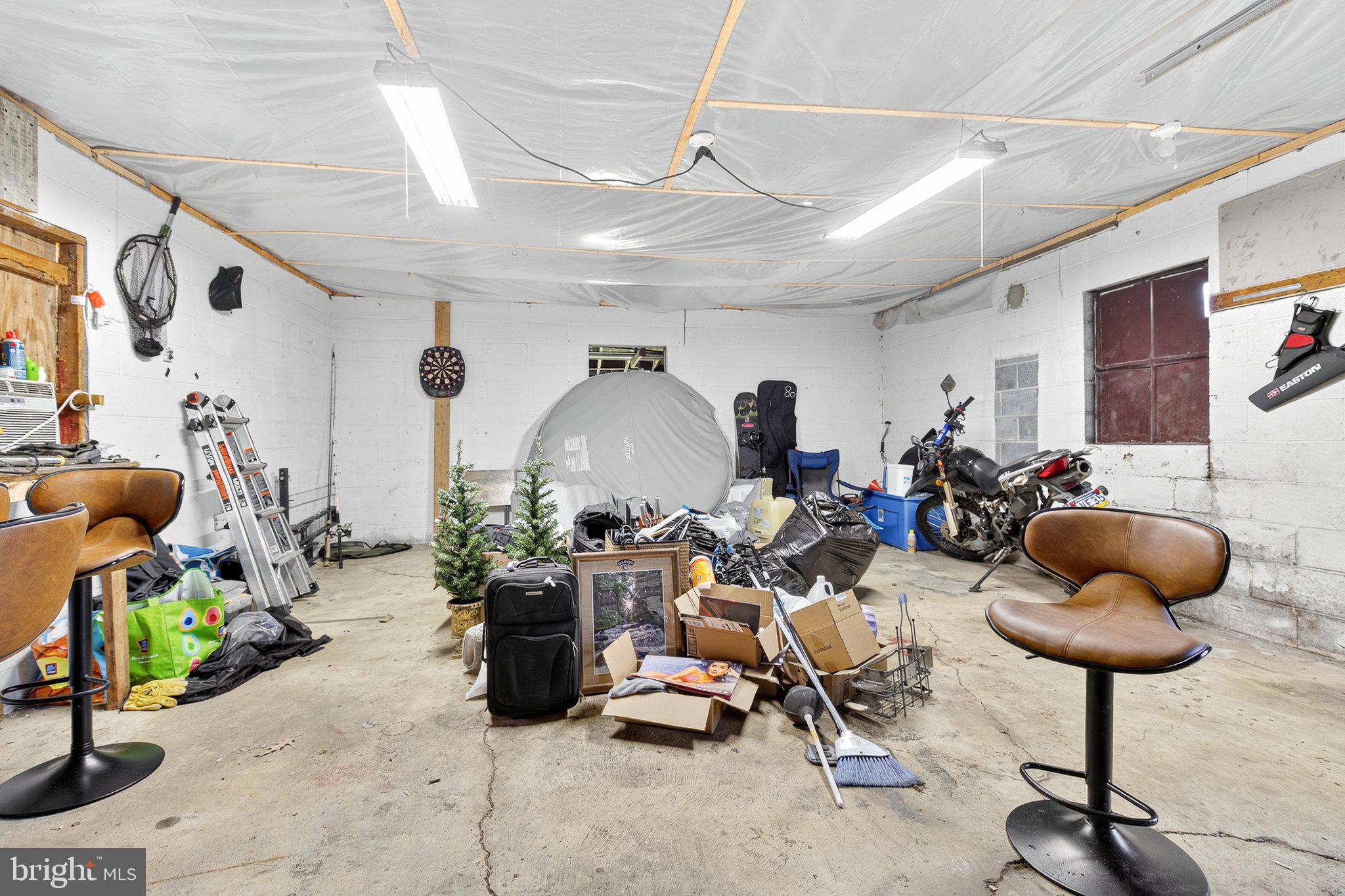 342 Frogtown Road Pequea, PA 17565 - Photo 36 of 37 a room with gym equipment and a table