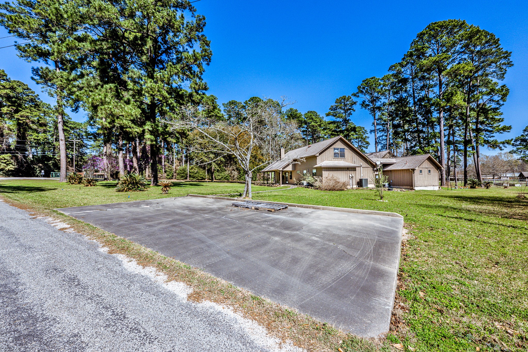 191 Timber Bay Drive Trinity, TX 75862 - Photo 43 of 48 Additional parking pad at the front of the property.