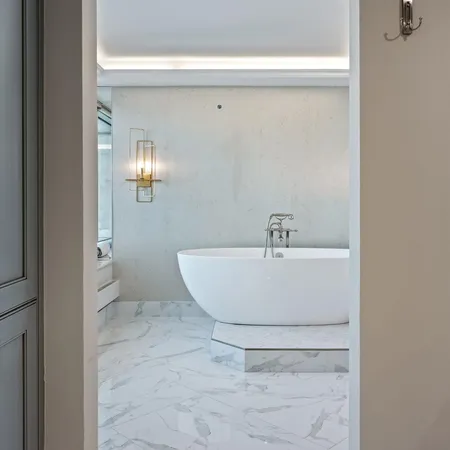 a bathroom with a sink and mirror