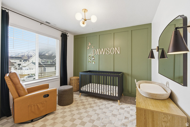 596 South Meade Street Mapleton, UT 84664 - Photo 11 of 38 Bedroom featuring light flooring and a nursery area