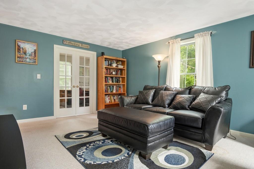 112 Weldon Farm Road Rowley, MA 01969 - Photo 8 of 33 a living room with furniture and a window