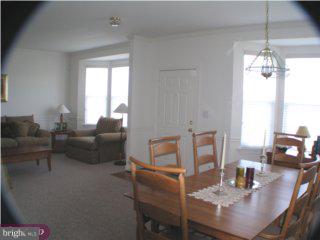 90 Chapel Hill Road Mount Laurel, NJ 08054 - Photo 3 of 6 a living room with furniture and a chandelier