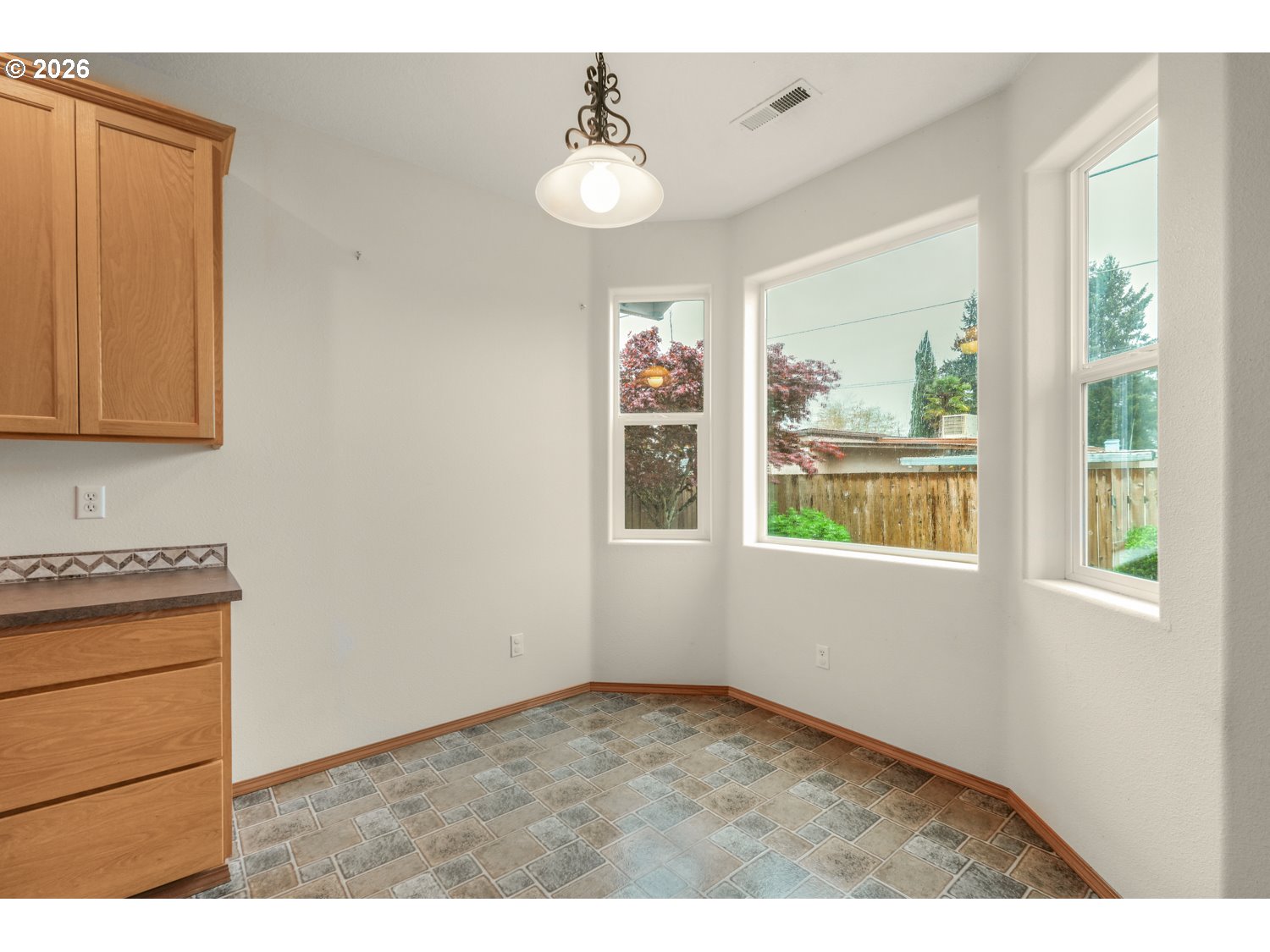 52234 Southeast Tyler Street Scappoose, OR 97056 - Photo 16 of 30 a view of an empty room with a window