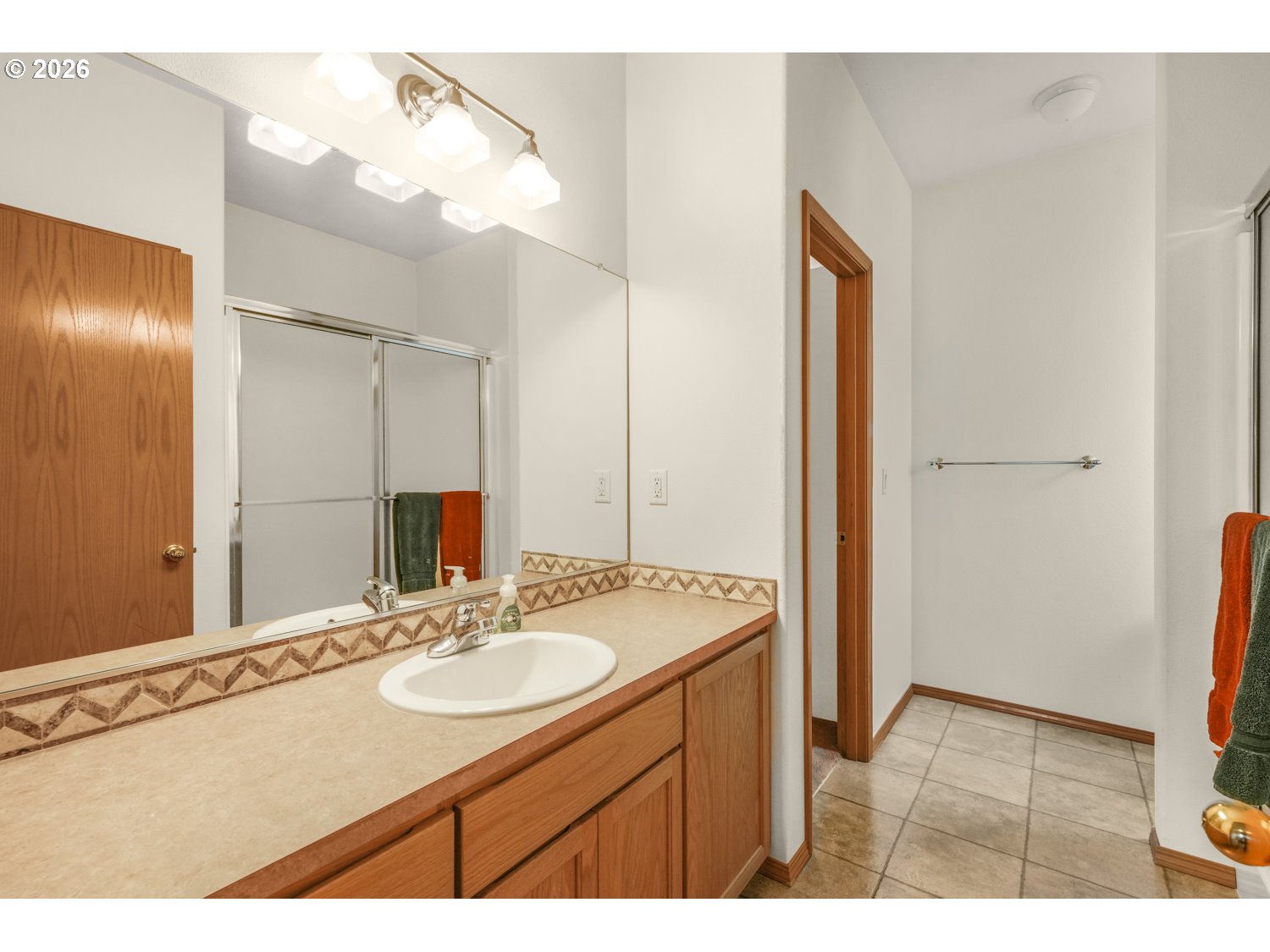 52234 Southeast Tyler Street Scappoose, OR 97056 - Photo 19 of 30 a bathroom with a sink double vanity and a mirror