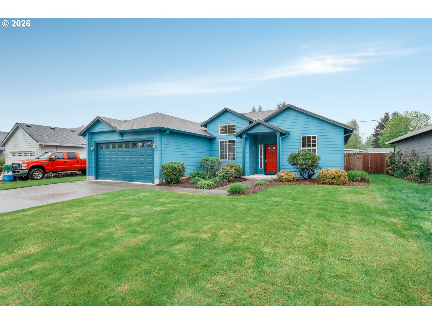 52234 Southeast Tyler Street Scappoose, OR 97056 - Photo 2 of 30 a front view of house with yard and green space