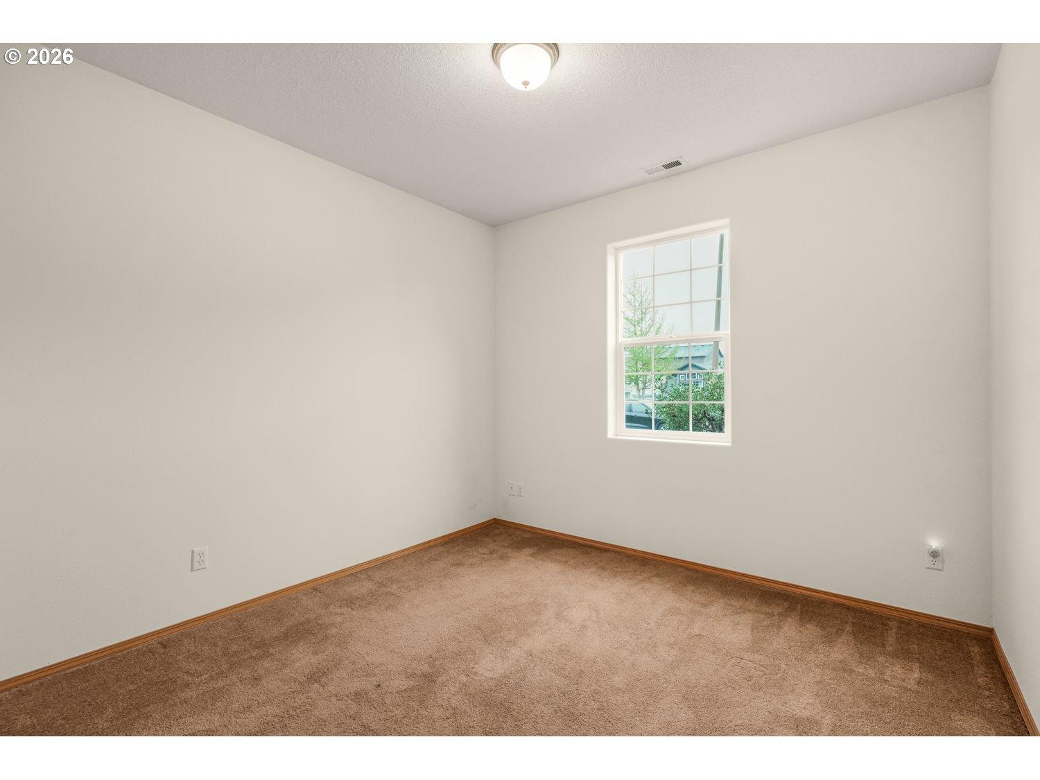 52234 Southeast Tyler Street Scappoose, OR 97056 - Photo 22 of 30 an empty room with a window
