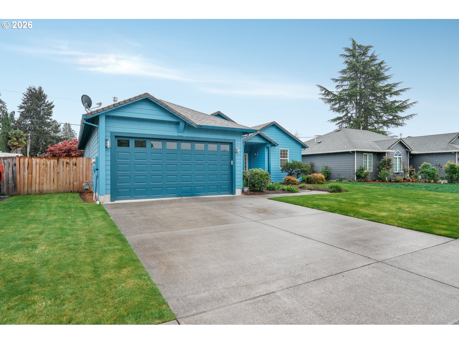 52234 Southeast Tyler Street Scappoose, OR 97056 - Photo 30 of 30 a front view of a house with a yard and garage