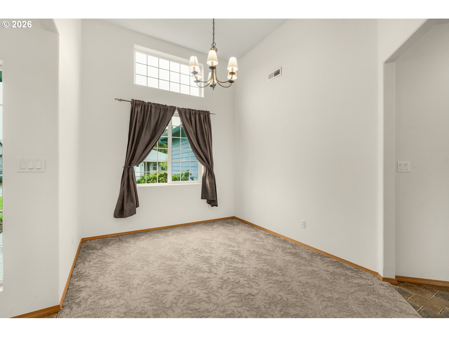 52234 Southeast Tyler Street Scappoose, OR 97056 - Photo 8 of 30 a view of empty room with window