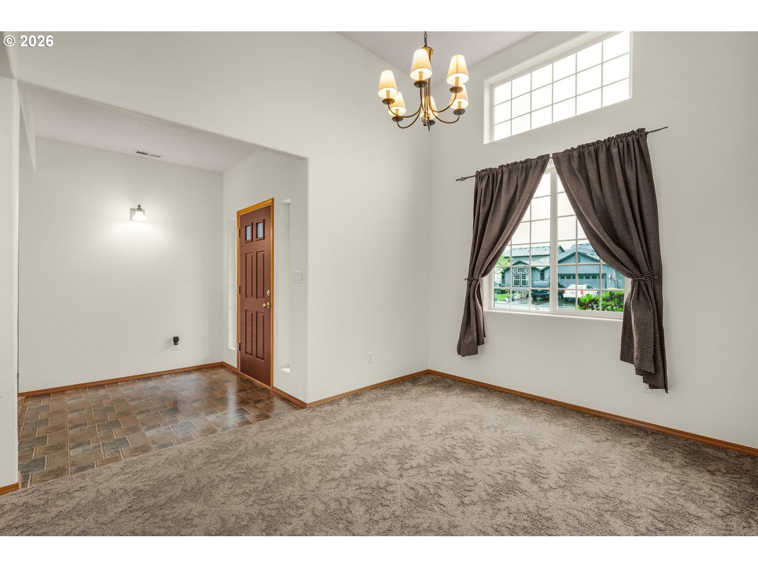 52234 Southeast Tyler Street Scappoose, OR 97056 - Photo 9 of 30 a view of an empty room with a window